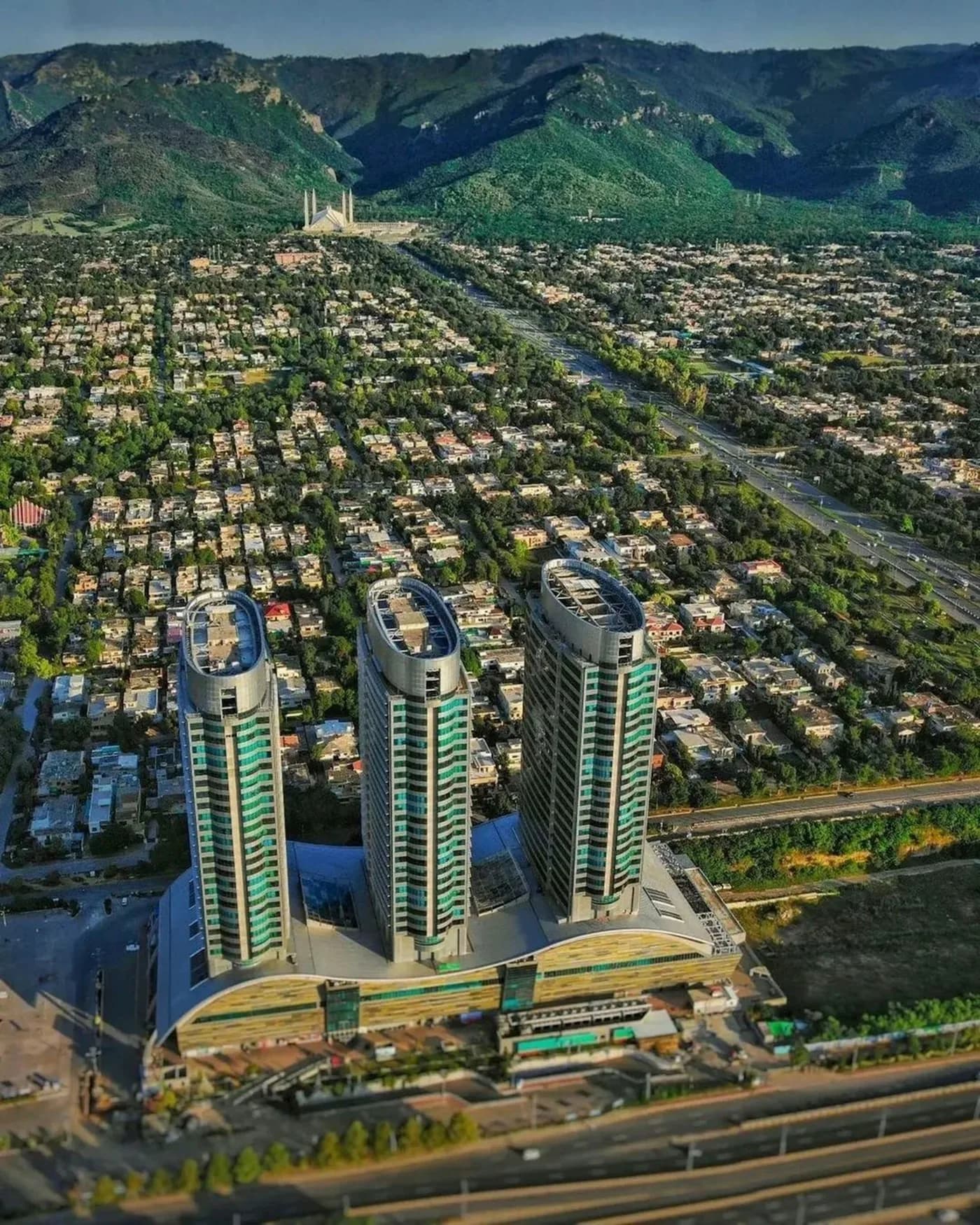 Aerial view of Islamabad with the Margalla Hills behind the city