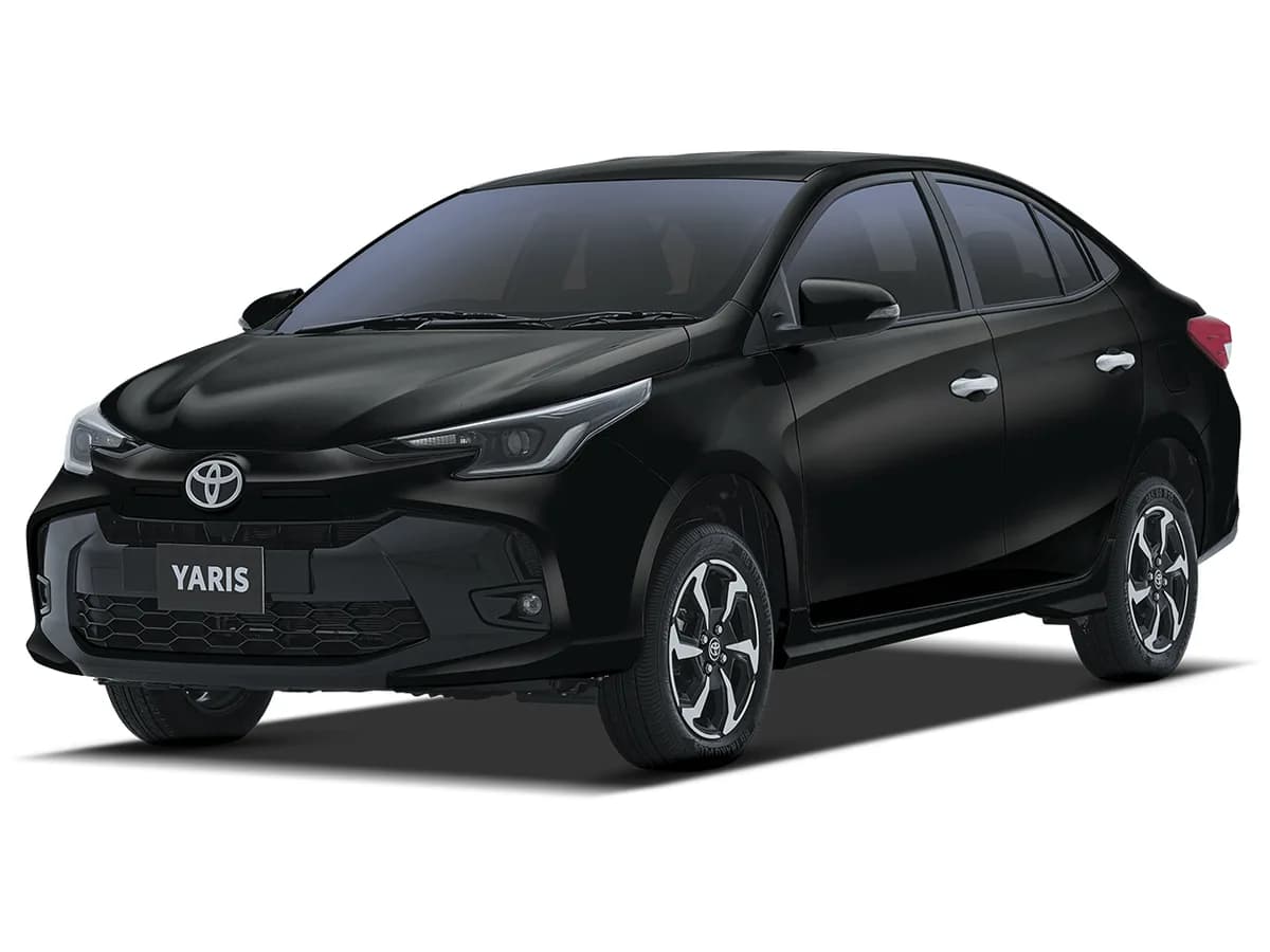 A black Toyota Yaris, rentable from a local host in Karachi