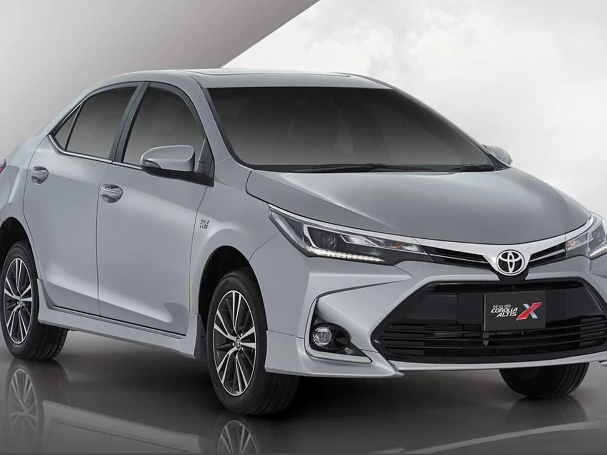A silver Toyota Corolla Altis X, rentable from a local host in Karachi